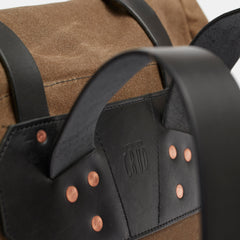 Roll top backpack with leather details and padded back