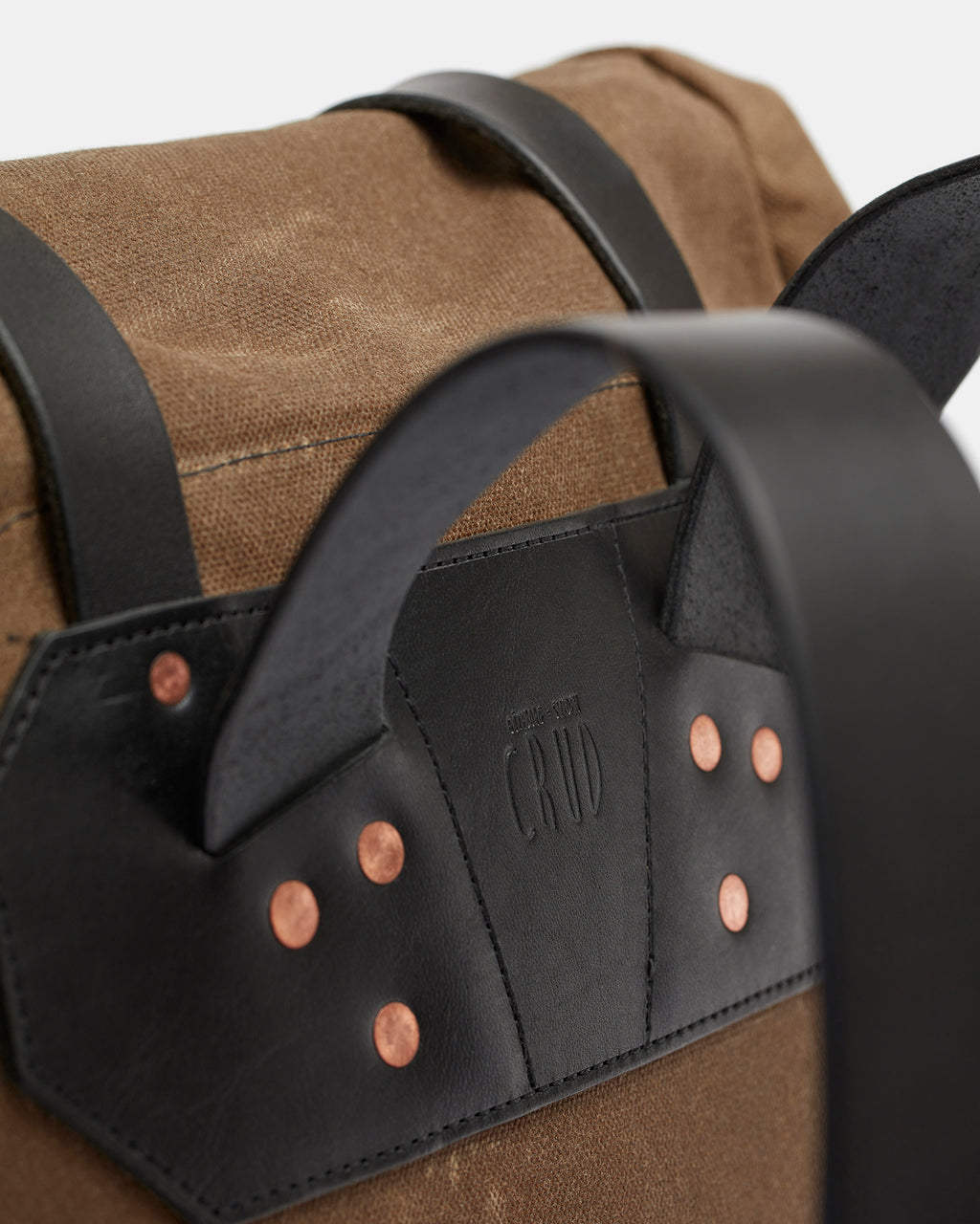 Roll top backpack with leather details and padded back