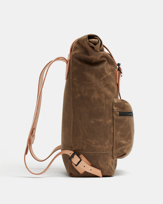 Natural waxed canvas roll top backpack with leather details