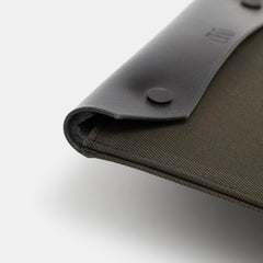Padded canvas laptop sleeve with leather details