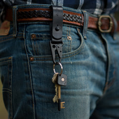 Handmade keychain with copper rivet and leather finish