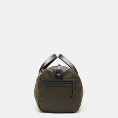 Heavy duty leather duffle bag with waxed canvas and brass zippers