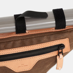 Gravel bike frame bag with exterior pocket and velcro straps